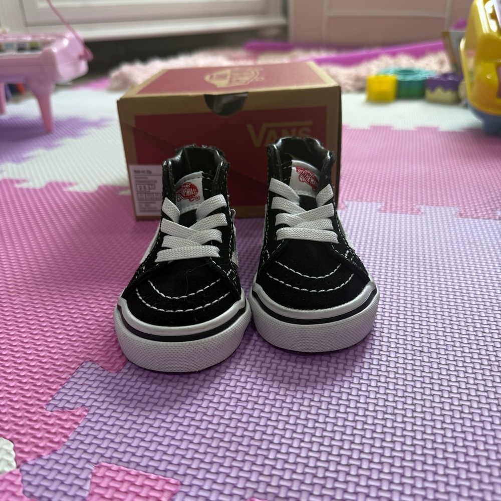 Vans Black and White High-Top Sneakers